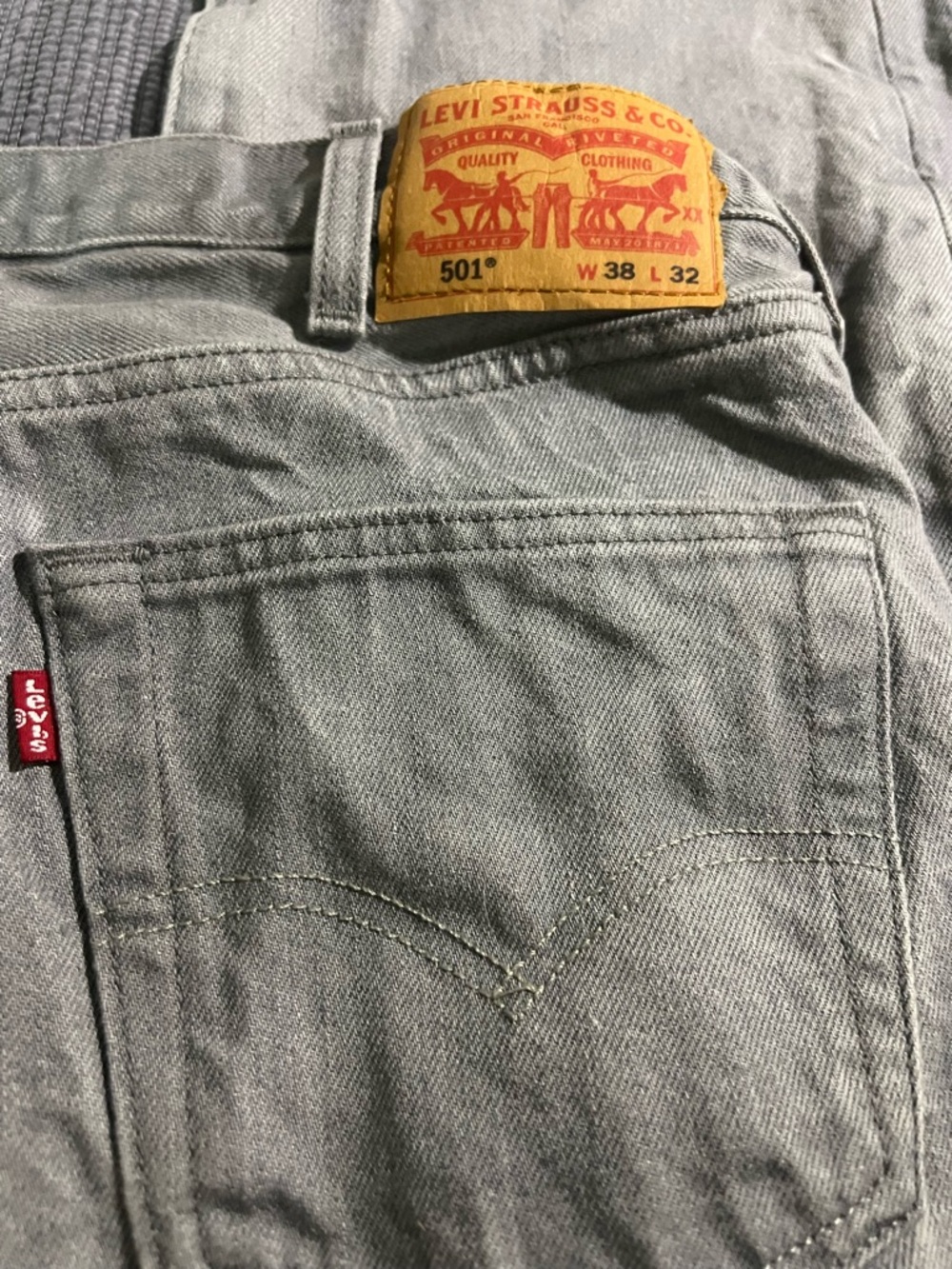 Brand new men’s Levi’s 501 jeans in gray wash. Never worn—only washed once,